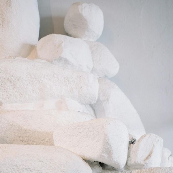 A stack of smooth stones balanced perfectly on top of each other.